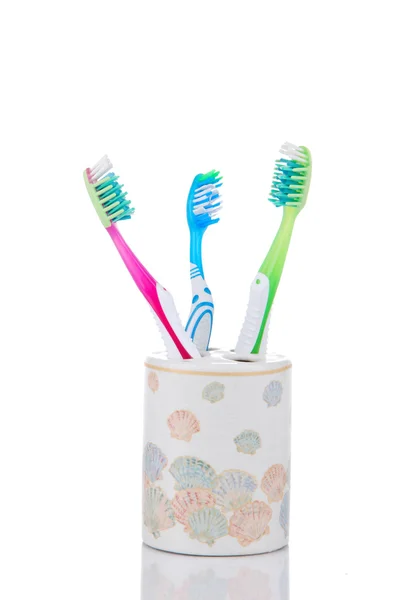 Tres cepillos dentales de vidrio decorativo —  Fotos de Stock