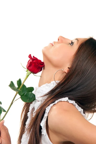 Young woman holding rose in hand — Stock Photo, Image