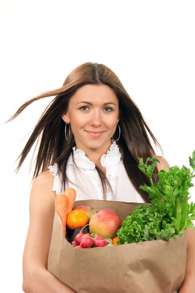 Vrouw die kruidenier zak verse voedingsmiddelen. — Stockfoto