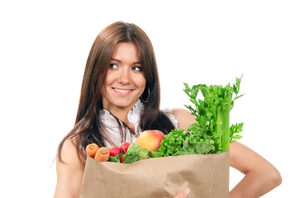 Женщина держит сумки с пищевыми ингредиентами — стоковое фото