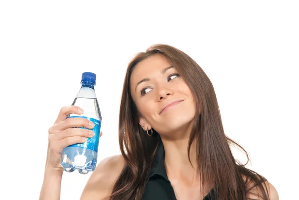 Vrouw met een fles water in haar hand — Stockfoto