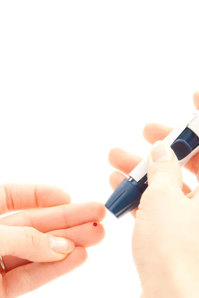 Diabetes lancet dedo picada para medição de sangue — Fotografia de Stock