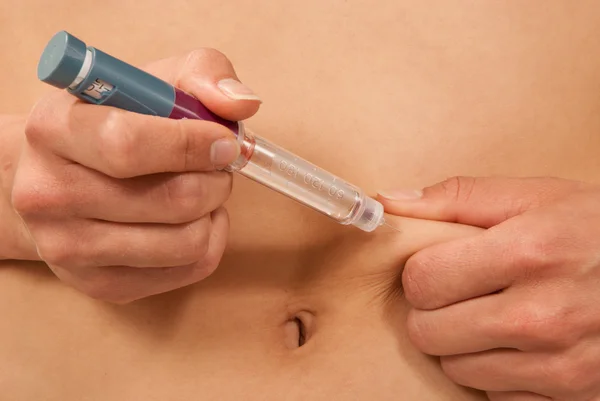Diabetes insulin syringe pen with dose of lantus — Stock Photo, Image