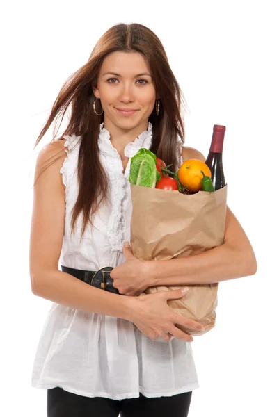 女人持有一个购物袋全素食食品杂货 — 图库照片