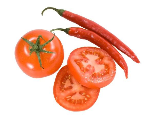 Red tomatoes with chilly peppers isolated on the white backgroun — Stock Photo, Image