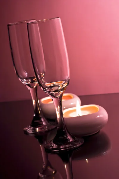 Champagneglas och ljus. — Stockfoto