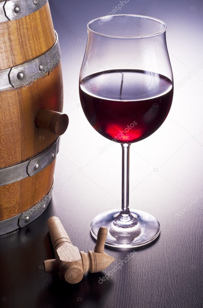 Delicious red wine in wooden barrels.