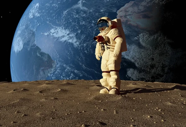 Αστροναύτης στο φόντο του πλανήτη. — Φωτογραφία Αρχείου