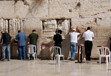 Believers around the Wailing Wall clipart