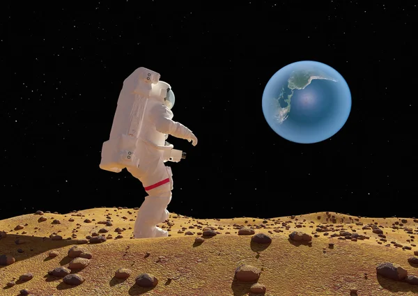 De astronaut op de achtergrond van de planeet. — Stockfoto