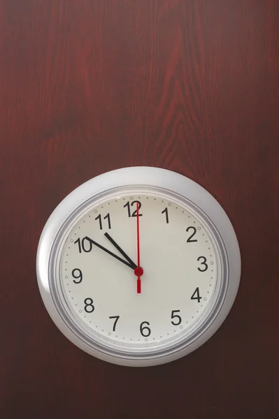 Clock on the board — Stock Photo, Image