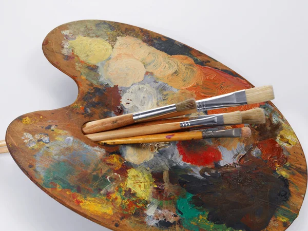 Paintbrushes and palette — Stock Photo, Image