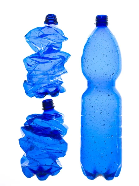 Blauwe plastic flessen — Stockfoto
