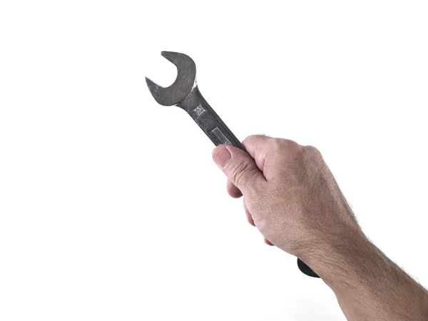 Hand and spanner — Stock Photo, Image