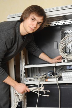 System administrator near server clipart