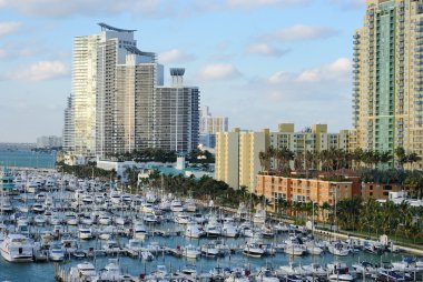 Skyline of the city of Miami, Florida with yachts and boats. clipart