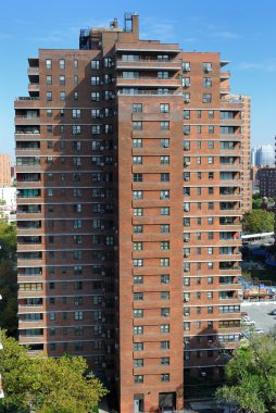 An urban residential building in Manhattan New York City. clipart