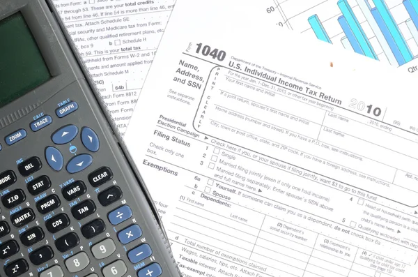 Paperwork Including 1040 Calculating Taxes — Stock Photo, Image
