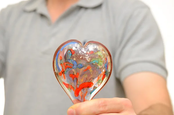 Man Holding Glass Heart Away His Chest — Stock Photo, Image