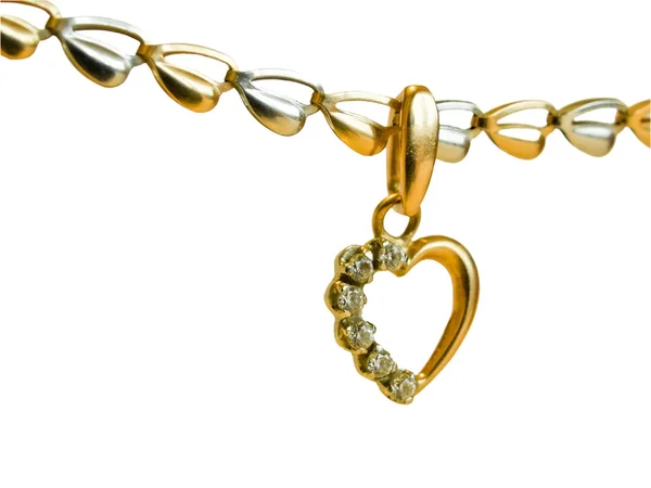 stock image Gold heart-shaped pendant on a chain