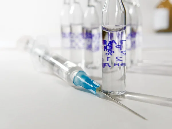 Disposable syringes and vials — Stock Photo, Image