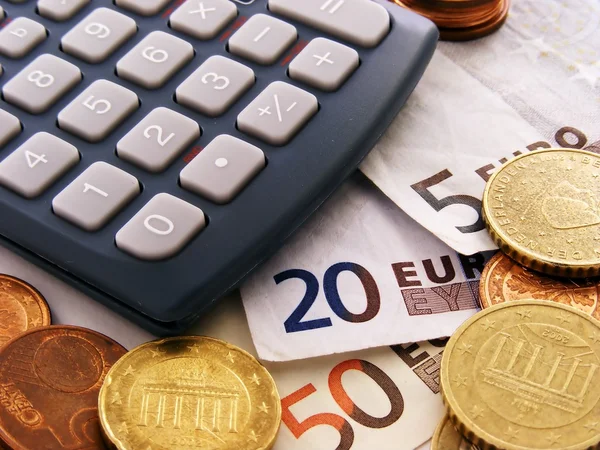 Calculadora e moeda do euro — Fotografia de Stock