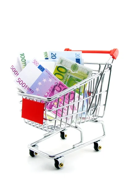 Moneda euro en un carrito de compras sobre un fondo blanco —  Fotos de Stock