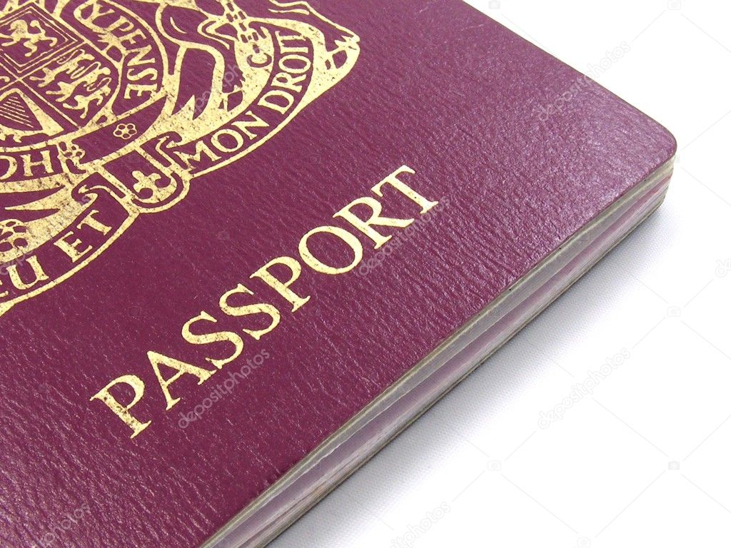 A close up of a British passport on a white background ...