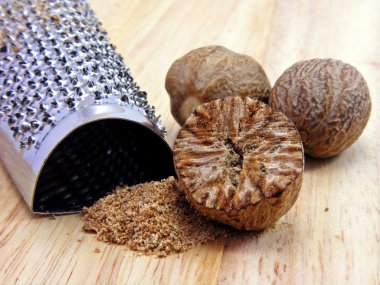 Selection of nutmeg with stainless steel hand grater