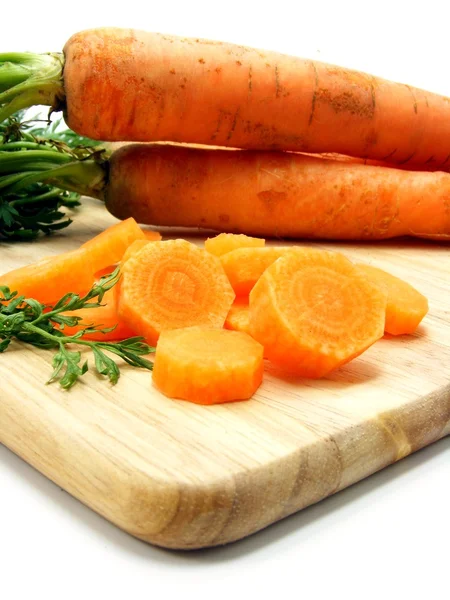 Rodajas de zanahoria fresca a bordo —  Fotos de Stock