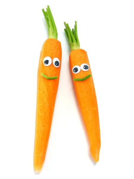 Cenouras frescas com rostos felizes — Fotografia de Stock
