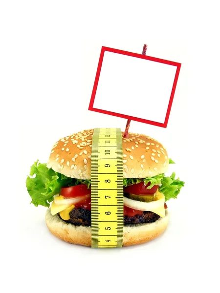 Una hamburguesa con cinta métrica y espacio para copiar — Foto de Stock