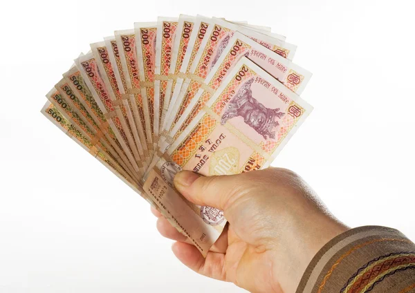 Ruka drží peníze účty ventilátor — Stock fotografie