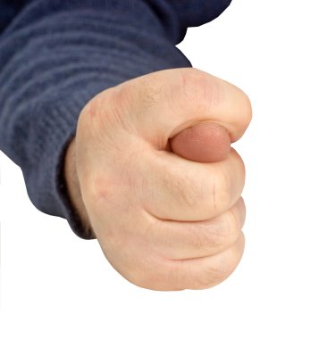 Man's hand gesture shows fig.