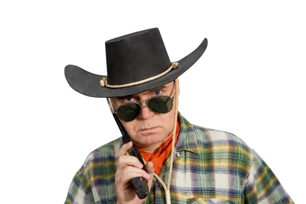 在牛仔服装和帽子的一个人 在摄影棚里拍摄 — 图库照片