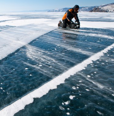 Shooting of winter Baikal clipart