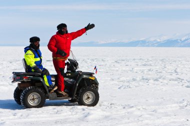 Travel on an ice of Baikal clipart