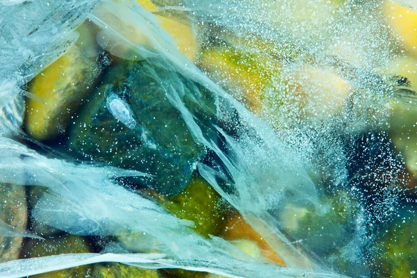 stock image Abstraction from the frozen ice and stones