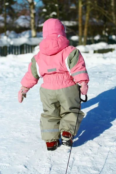 Child Pulling sledges — Stock Photo, Image