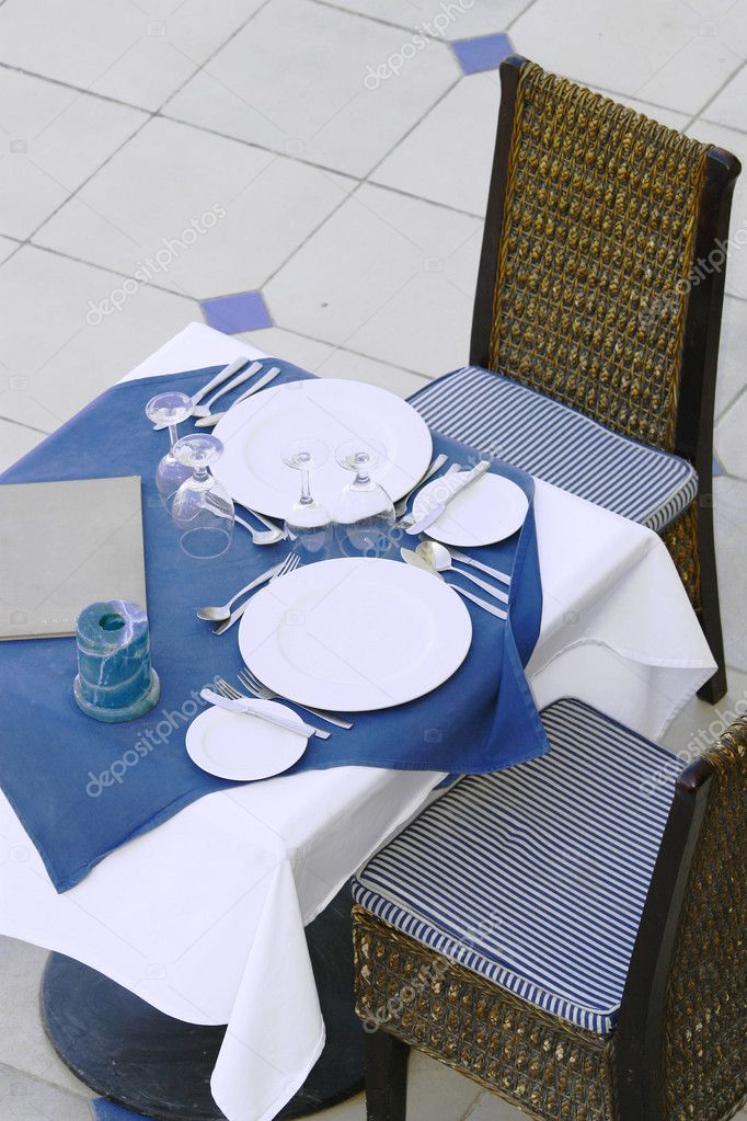 Part a restaurant table, ready to invite somebody