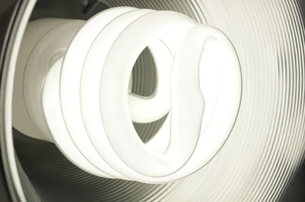 stock image Compact Fluorescent Light Bulb Glowing