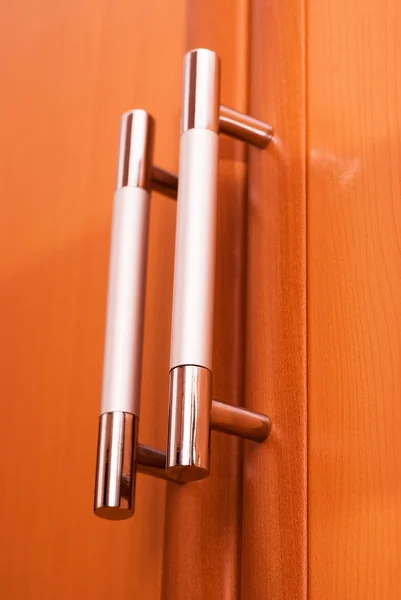 Furniture handles on the doors — Stock Photo, Image