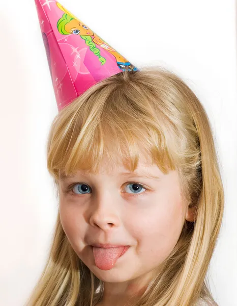 Girl shows off her tongue — Stock Photo, Image