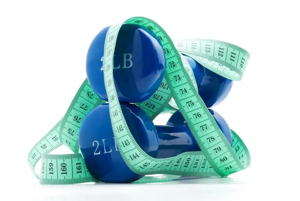 Dumbbells and tape measure — Stock Photo, Image