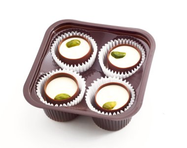 Chocolates with pistachio nuts clipart