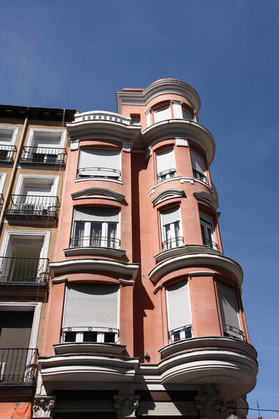 Old ornamental building at famous Calle Mayor in Madrid, Spain