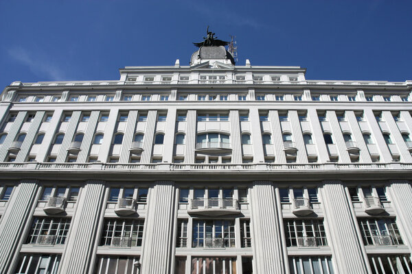 Old ornamental building at Gran Via in Madrid, Spain