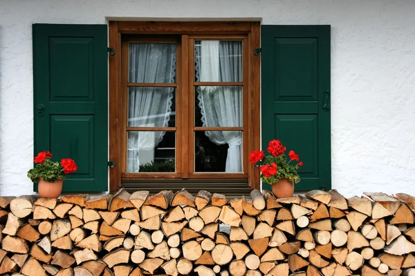 Firewood and window — Stock Photo, Image
