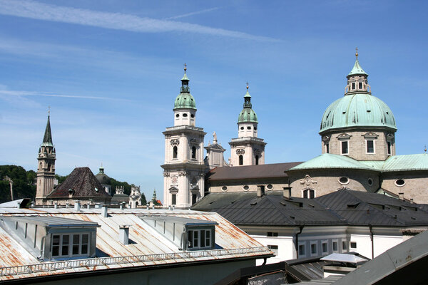 Salzburg skyline with cathedral on the right and Franciscan church on the left. Beautiful old town.