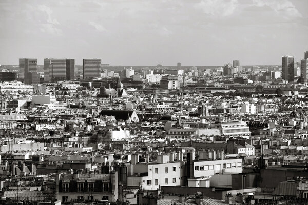 Cityscape of Paris seen from Montmartre hill. Black and white.